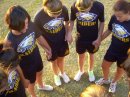 Girls preying before competition